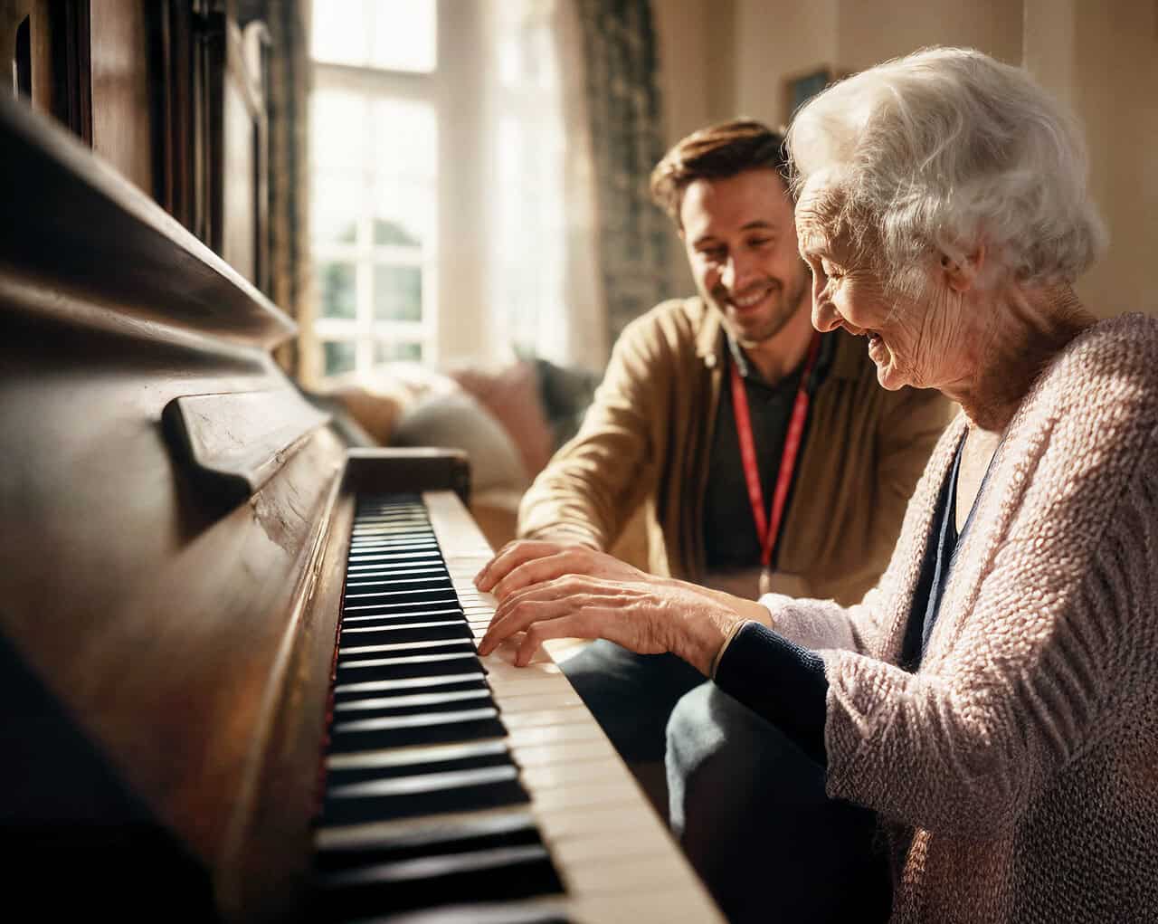 Woman plays piano with caregiver as loved ones enjoy respite break